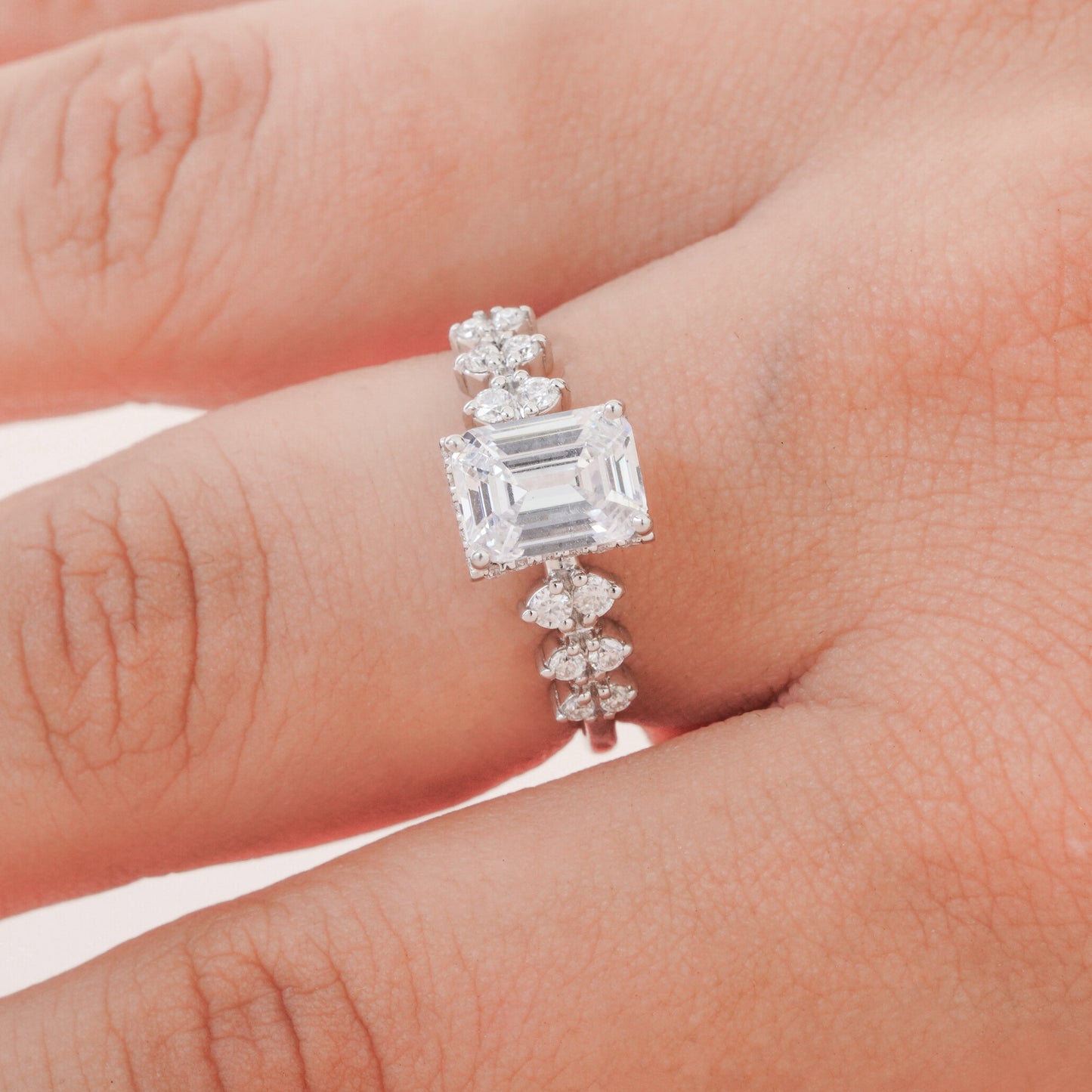 Traditional Emerald Cut with Round Cut Stone Beauty on Band